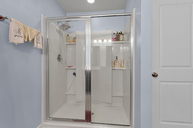 bathroom featuring walk in shower