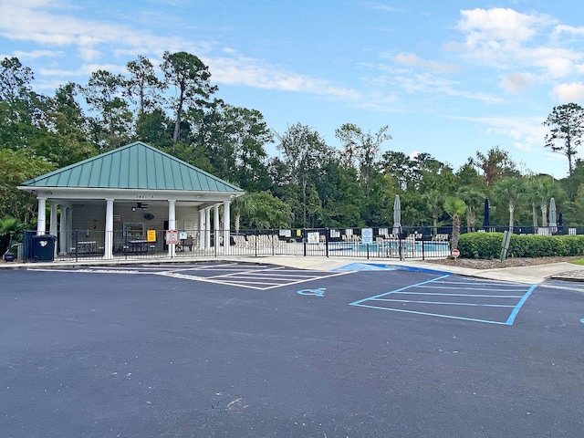 view of parking featuring ceiling fan