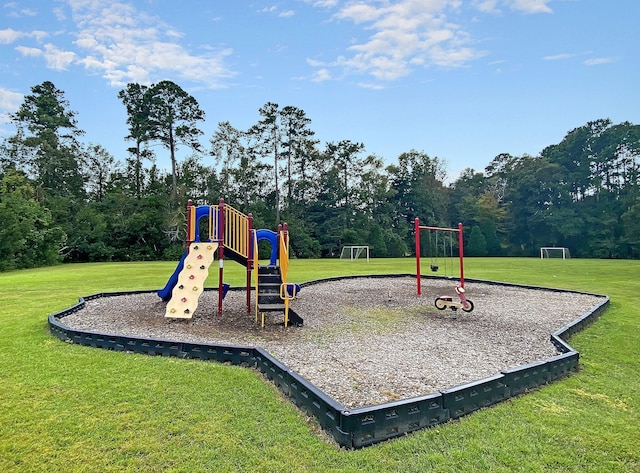 view of jungle gym featuring a yard