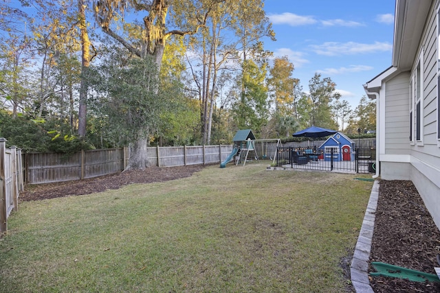 view of yard with a playground