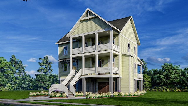 view of front of property with a balcony and a front yard