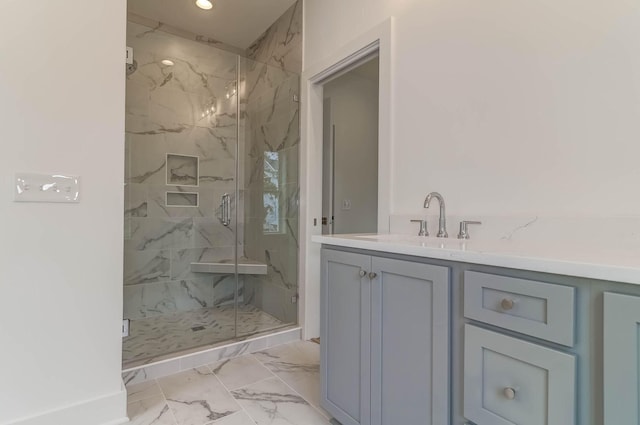 bathroom featuring vanity, tile flooring, and a shower with shower door