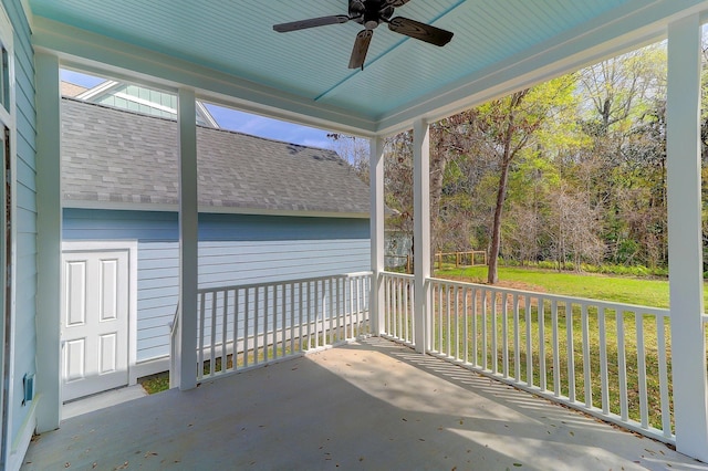 exterior space featuring ceiling fan