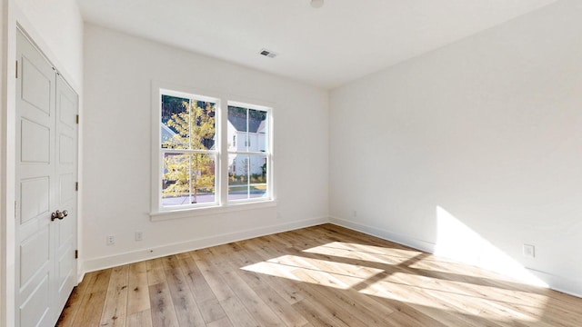 empty room featuring light hardwood / wood-style floors