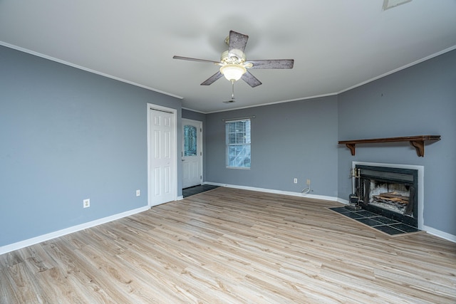 unfurnished living room featuring crown molding, ceiling fan, and light wood-type flooring