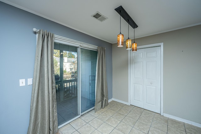 unfurnished dining area featuring light tile patterned flooring and ornamental molding