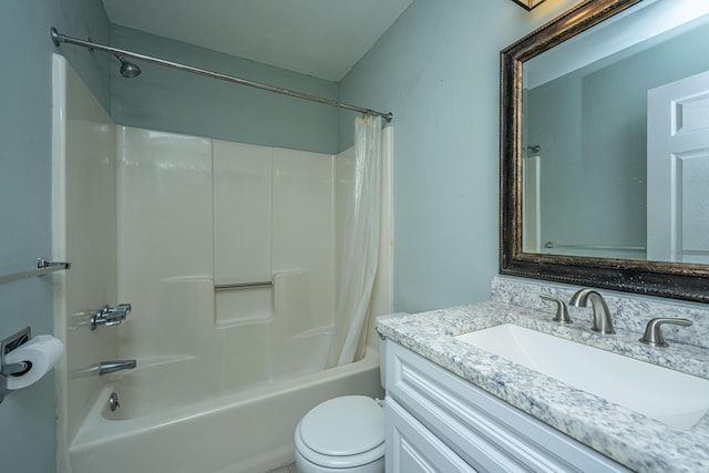 full bathroom featuring shower / bathtub combination with curtain, vanity, and toilet