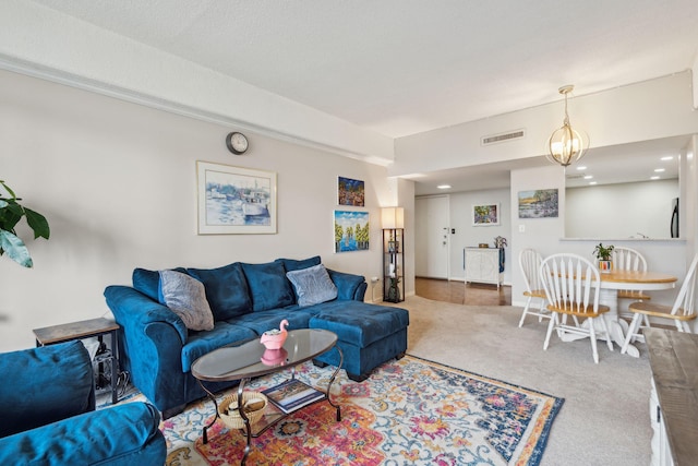 carpeted living area with visible vents