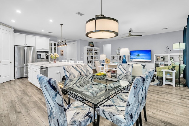 554 Tidewater Chase Ln, Summerville, SC 29486 - dining room with light wood finished floors and recessed lighting