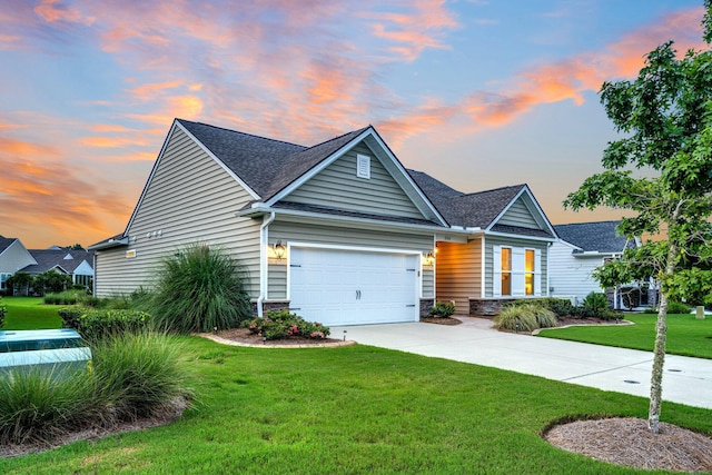 554 Tidewater Chase Ln, Summerville, SC 29486 - view of front facade with driveway, a lawn, a shingled roof, and an attached garage