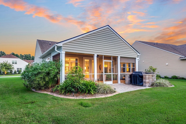 554 Tidewater Chase Ln, Summerville, SC 29486 - back of property featuring a patio area, a yard, and a sunroom
