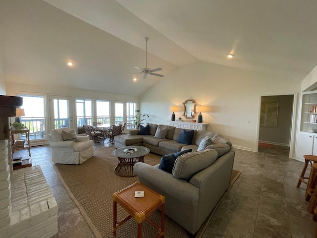 living room featuring vaulted ceiling and ceiling fan