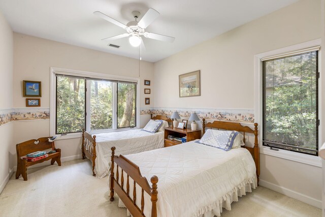 2938 Old Drake Dr, Seabrook Island, SC 29455 - carpeted bedroom featuring baseboards and a ceiling fan