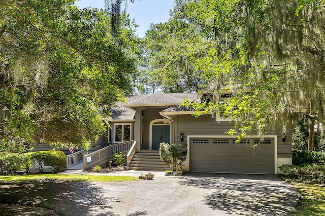 2938 Old Drake Dr, Seabrook Island, SC 29455 - view of front of house featuring asphalt driveway and roof with shingles