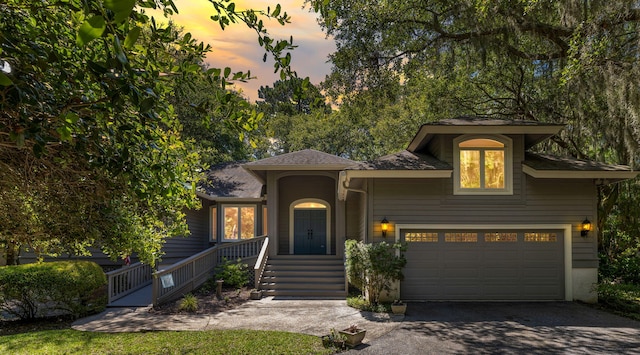 2938 Old Drake Dr, Seabrook Island, SC 29455 - view of front of house with asphalt driveway and a garage