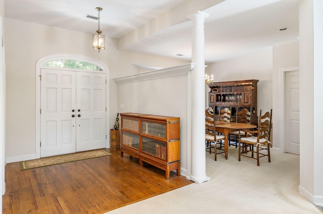 2938 Old Drake Dr, Seabrook Island, SC 29455 - foyer entrance featuring ornate columns and a chandelier