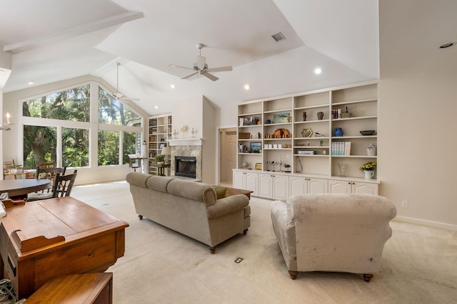 2938 Old Drake Dr, Seabrook Island, SC 29455 - living room with ceiling fan, vaulted ceiling, a tile fireplace, recessed lighting, and light carpet