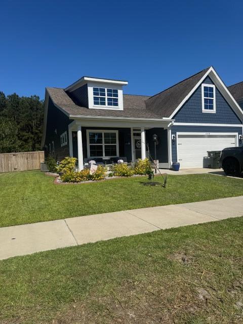 359 Whispering Breeze Ln, Summerville, SC 29486 - view of front facade featuring covered porch, driveway, and an attached garage