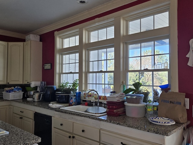 kitchen featuring dishwasher, sink, dark stone counters, and ornamental molding