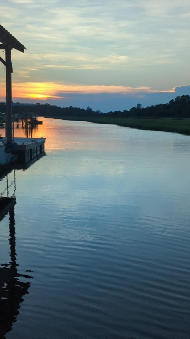 property view of water featuring a dock