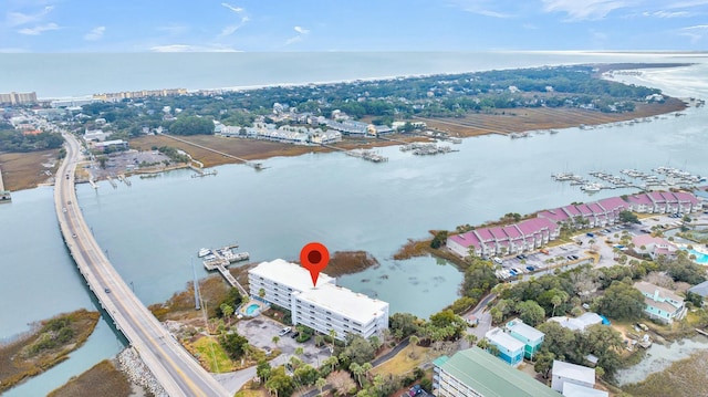 birds eye view of property featuring a water view