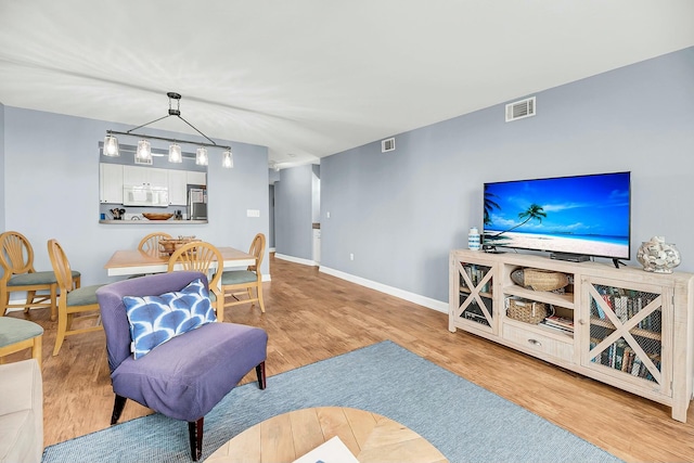 living room with light wood-type flooring