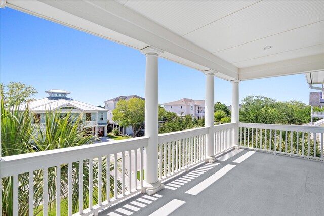 balcony with a porch and a residential view