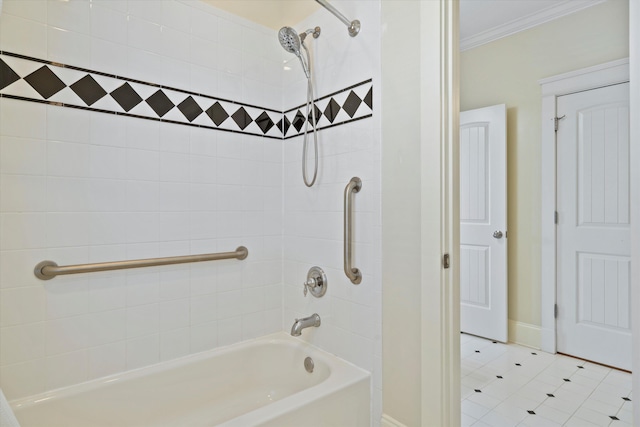 bathroom with crown molding, tile patterned floors, baseboards, and shower / washtub combination