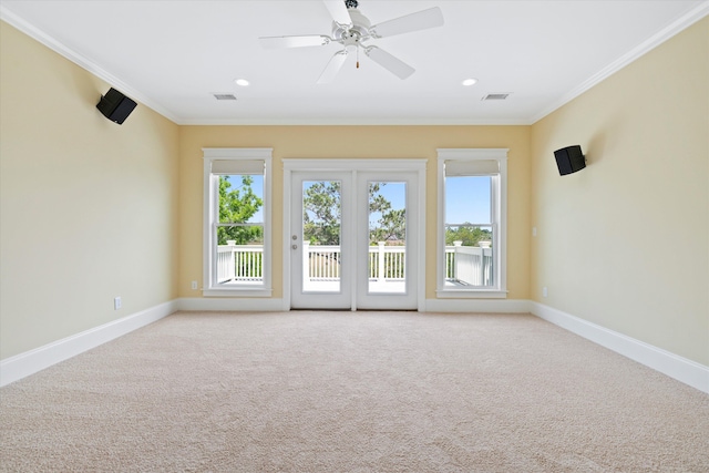 carpeted empty room with ornamental molding, baseboards, ceiling fan, and recessed lighting