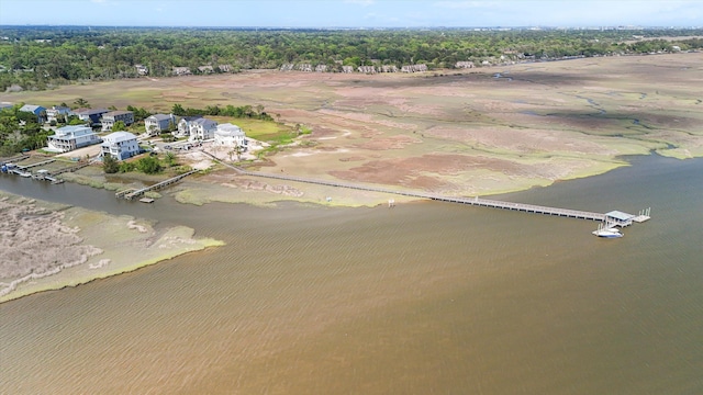 aerial view of property's location featuring a nearby body of water