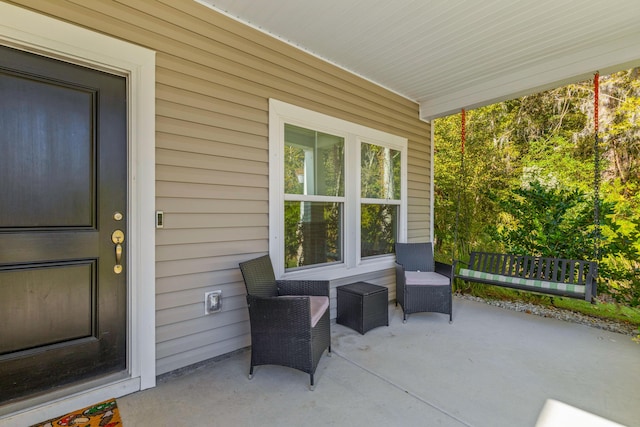 view of patio featuring covered porch