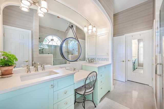 bathroom with vanity and a shower stall