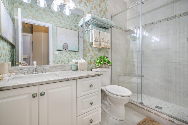 bathroom with wallpapered walls, a shower stall, toilet, and vanity