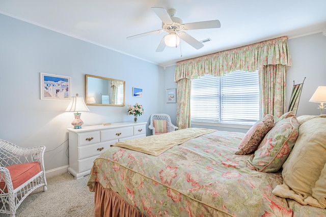 bedroom featuring light carpet, ceiling fan, baseboards, and ornamental molding