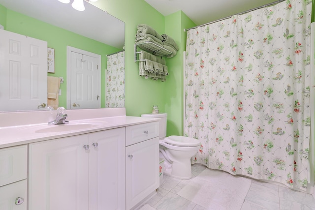 full bathroom with vanity, tile patterned floors, toilet, and a shower with curtain