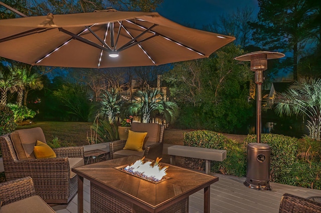 deck featuring a fire pit