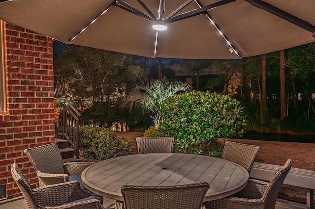 view of patio featuring outdoor dining area