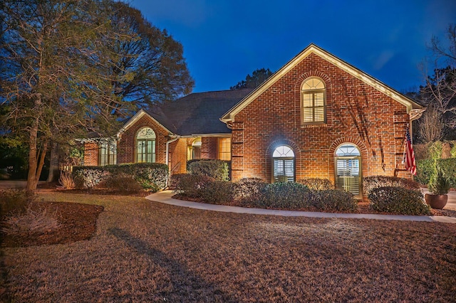 view of front of home with brick siding