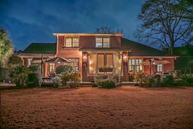 exterior space featuring brick siding