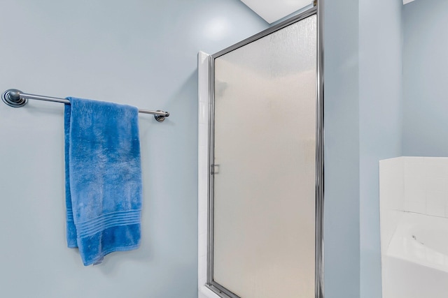 full bathroom with a garden tub and a stall shower
