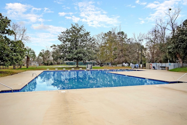 community pool with a patio