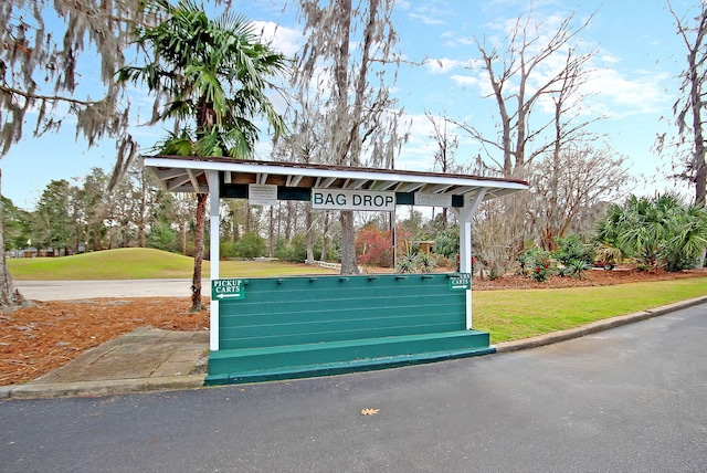 surrounding community featuring a yard