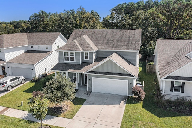 view of front facade featuring a garage and a front yard