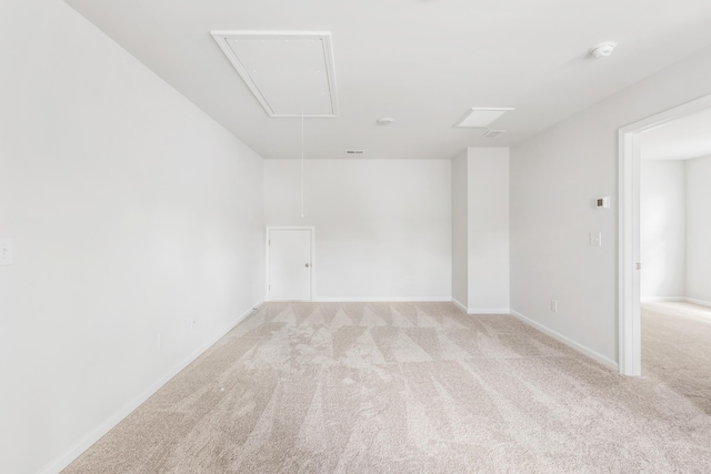 191 E Pinckney St, Summerville, SC 29485 - unfurnished room featuring attic access, light carpet, and baseboards