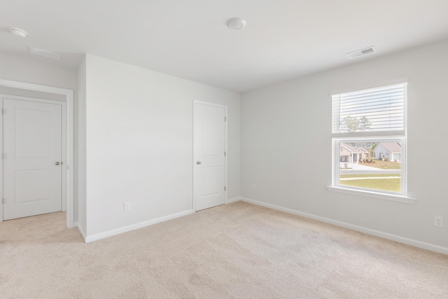 191 E Pinckney St, Summerville, SC 29485 - carpeted empty room featuring baseboards and a smoke detector