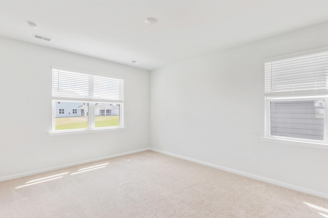 191 E Pinckney St, Summerville, SC 29485 - carpeted spare room with baseboards and a smoke detector