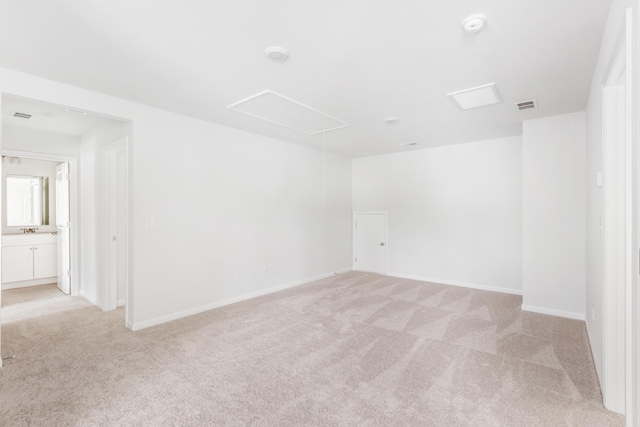 191 E Pinckney St, Summerville, SC 29485 - spare room featuring attic access, light colored carpet, baseboards, and a smoke detector
