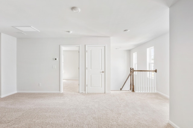 191 E Pinckney St, Summerville, SC 29485 - carpeted empty room with baseboards