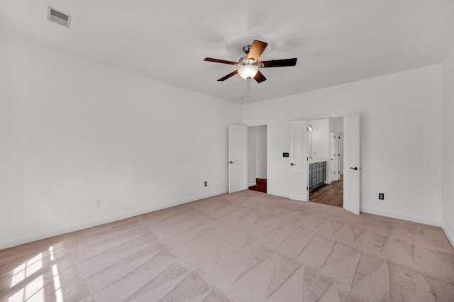 unfurnished bedroom featuring carpet flooring and ceiling fan