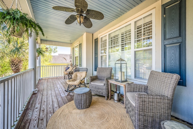 deck featuring ceiling fan and covered porch